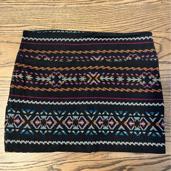 Forever21 - size medium, multi-colour patterned over black, mini skirt. - Picture 1 of 2